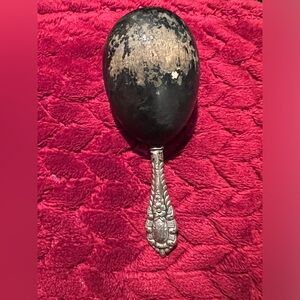 Antique Victorian darning egg with sterling silver handle